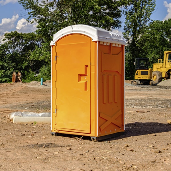 what is the cost difference between standard and deluxe portable restroom rentals in Winton